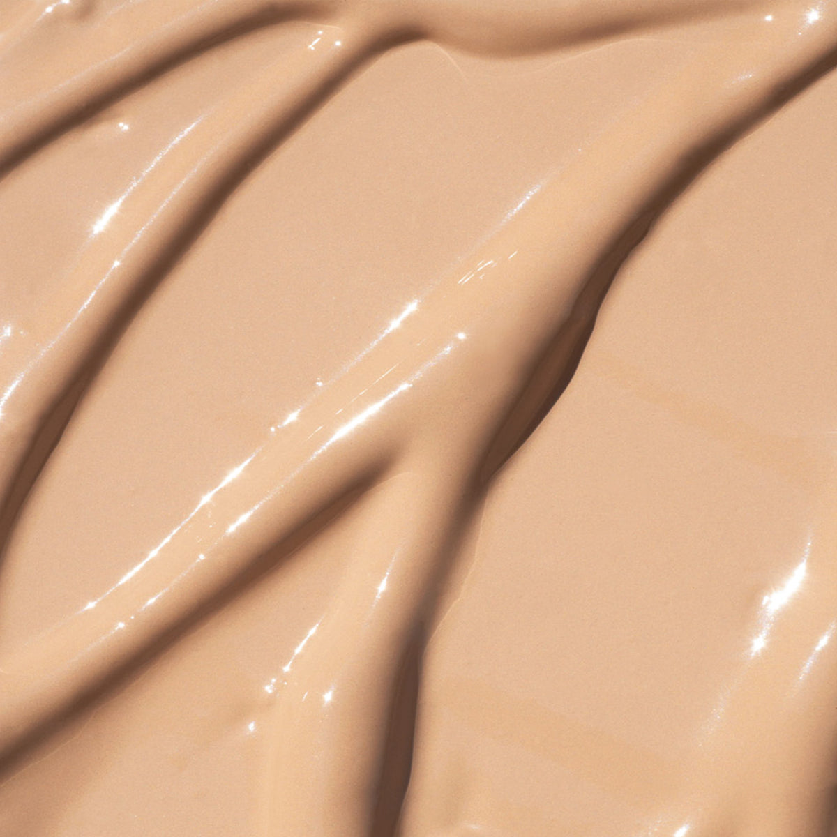 Tekstur af MÁDARA THE CONCEALER i nuancen Sand 33 – let og dækkende – Nordisk Balance